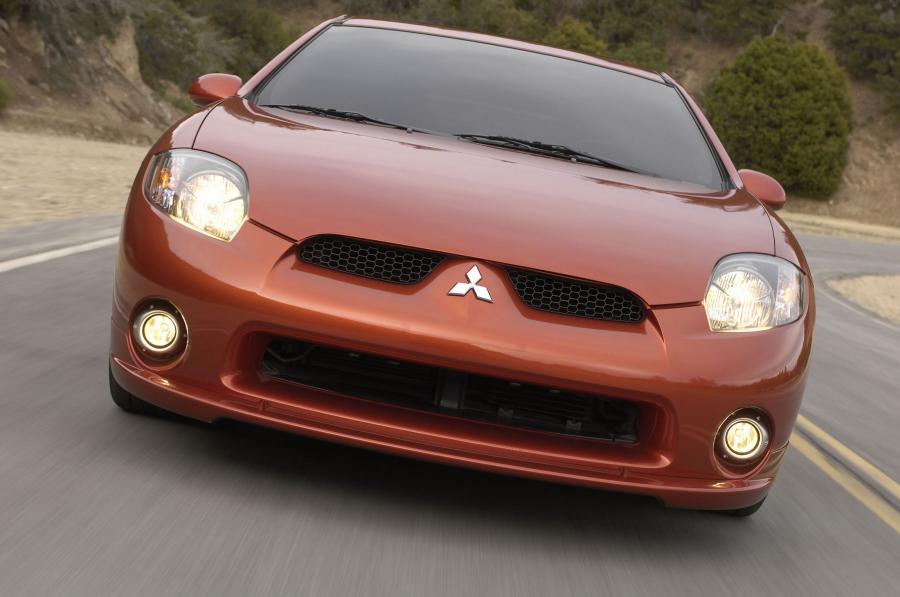  Mitsubishi Eclipse 2009 года  (фото 91 из 205)